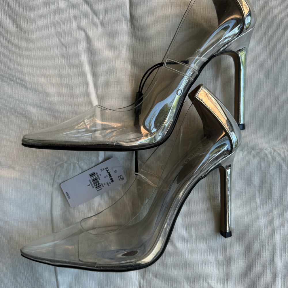Brand new with tags clear metallic heels perfect for any occasion.